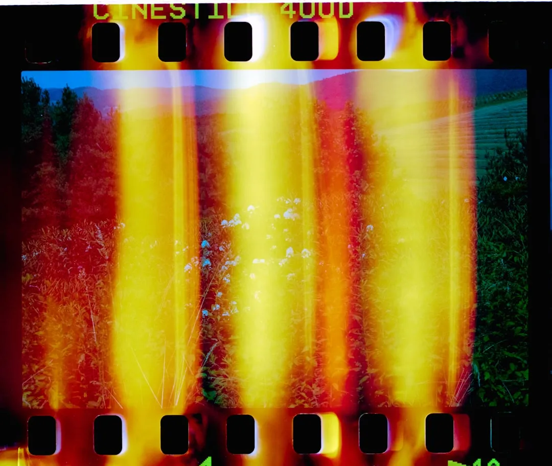 Film strip with abstract fiery light leaks.