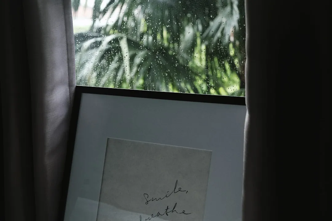 black photo frame on closed window