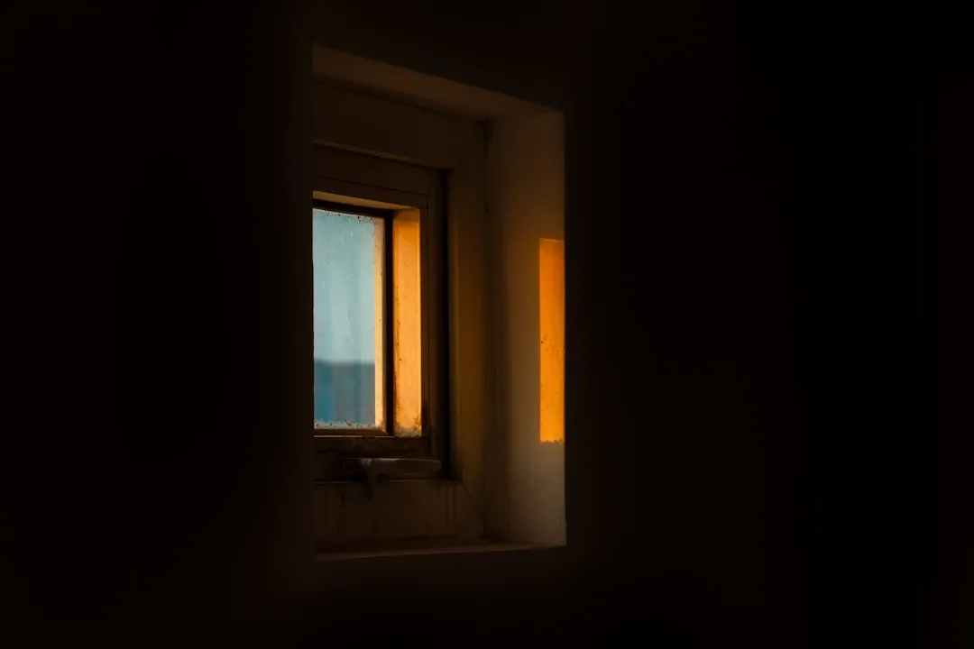 A window with a view of a body of water