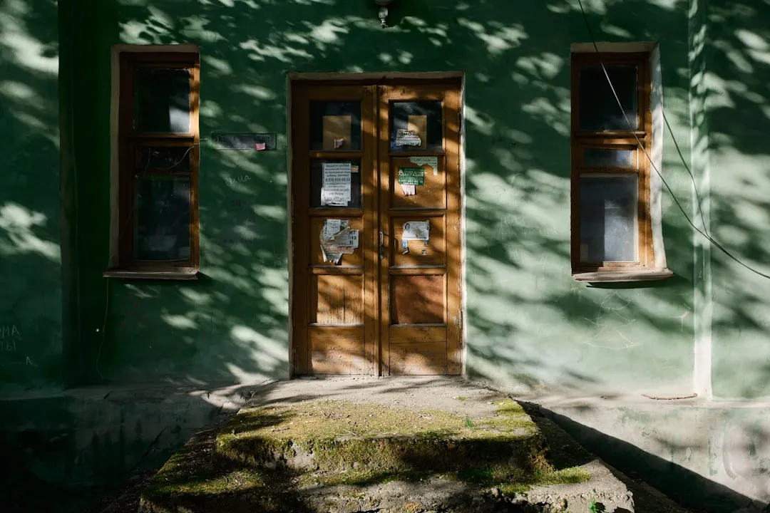 brown wooden framed glass doors