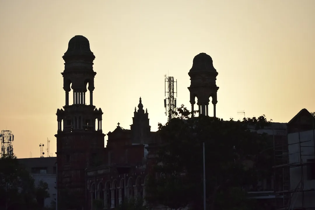 silhouette of building during sunset
