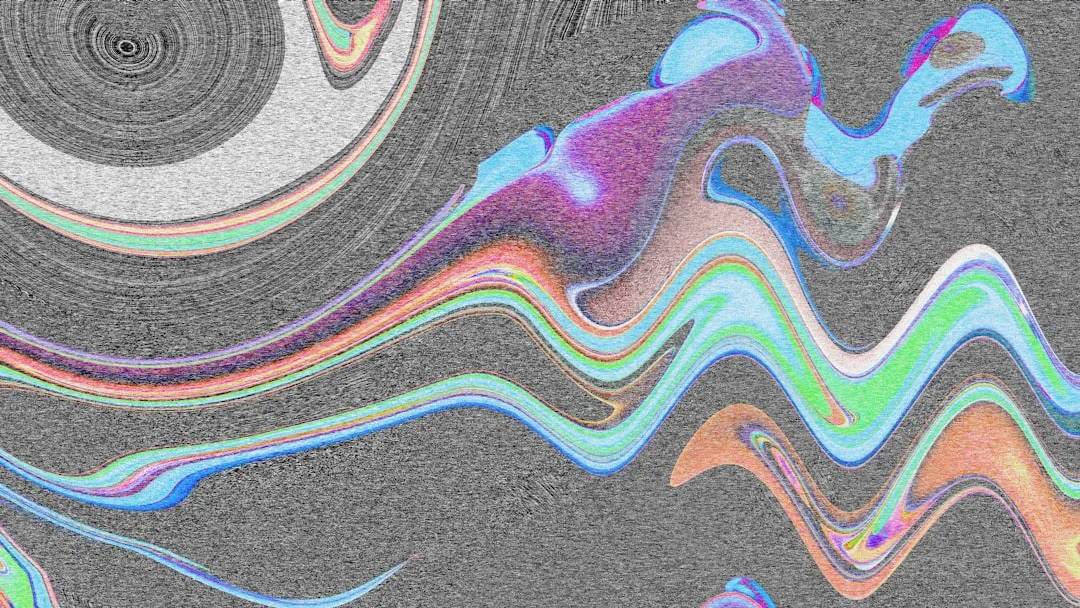 Abstract, colorful, and wavy shapes on a gray background.